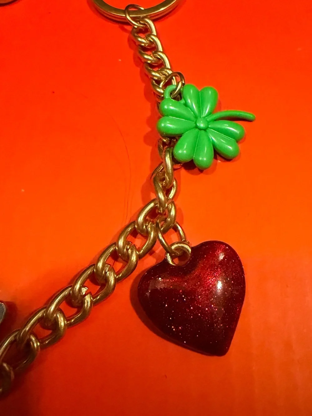 Designer inspired bag charm chain.